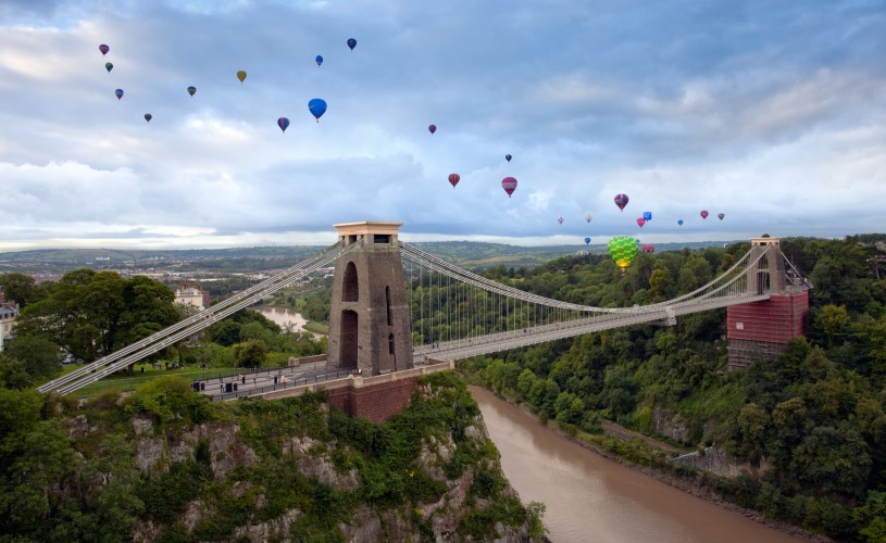 Hot air balloons flying over Clifton Suspension Bridge